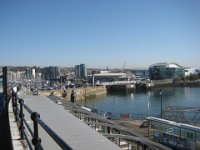 KingRichardIIIandFootball012  Somewhere behind that first building in the middle was my Premier Inn for these two days. From here to there across the white bridge is approx. 10 minutes. Via the harbour on the left, it is about 20 minutes.